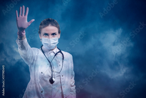 Tableau sur toile Woman in a medical mask