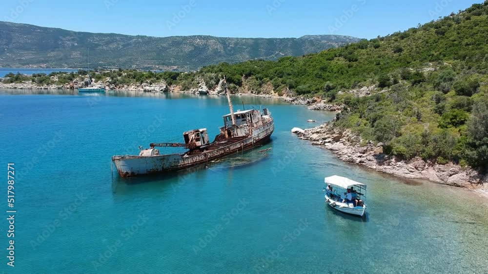 Aerial view over rusty shipwreck of an old cargo boat at Peristera island near Alonissos, Greece Aerial view over rusty shipwreck of an old cargo boat at Peristera island near Alonissos, Greece