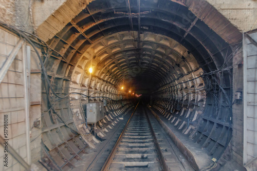 Inside round underground subway tunnel