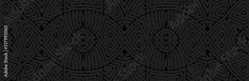 Banner, creative cover design. Embossed ethnic vintage 3d pattern on a black background, art deco style. Tribal artistic geometric ornaments for websites, presentations.