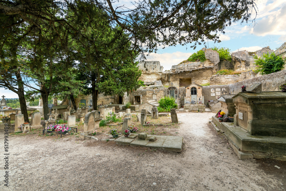 The Cimetière Les Baux de Provences or Old Cemetery at the historic village of Les Baux in the Alpilles mountains of Southern France. The Cimetière Les Baux de Provences or Old Cemetery at the historic village of Les Baux in the Alpilles mountains of Southern France.