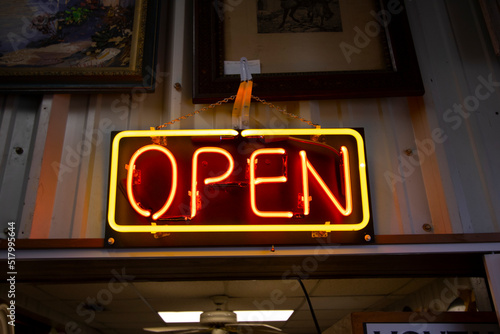 Wallpaper Mural A beautiful, glowing neon Open sign an entrance  Torontodigital.ca