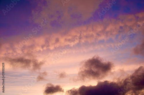pink fluffy clouds in sky
