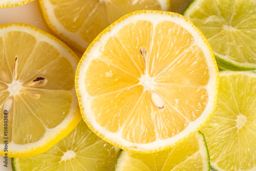 Lemon and lime slices on the board citrus fruit fresh healthy summer concept Lemon and lime slices on the board citrus fruit fresh healthy summer concept