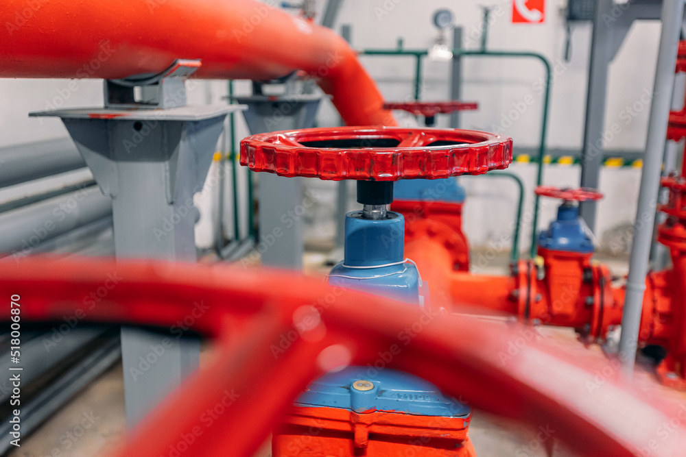 Pressure meters on natural gas yellow pipeline red valves. Concept industry background banner