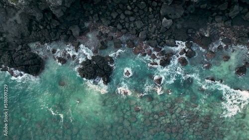 A scene of waves rushing to the shore, in Jeju. 제주 해안으로 밀려오는 파도.	
 photo