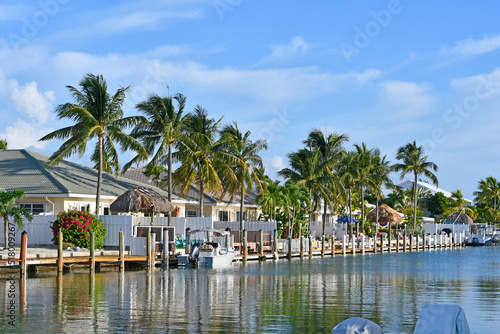 Waterfront homes with palm trees at Marathon Key in the Florida Keys