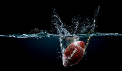 Football ball in water . Mixed media