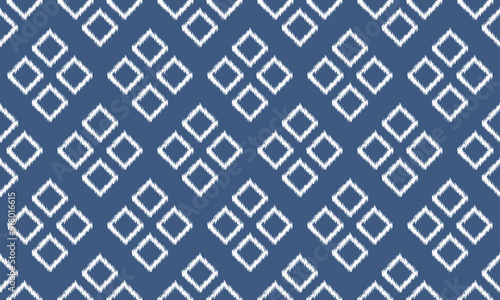 Ikat ethnic background vector. Seamless pattern in white square shapes on dark blue background.