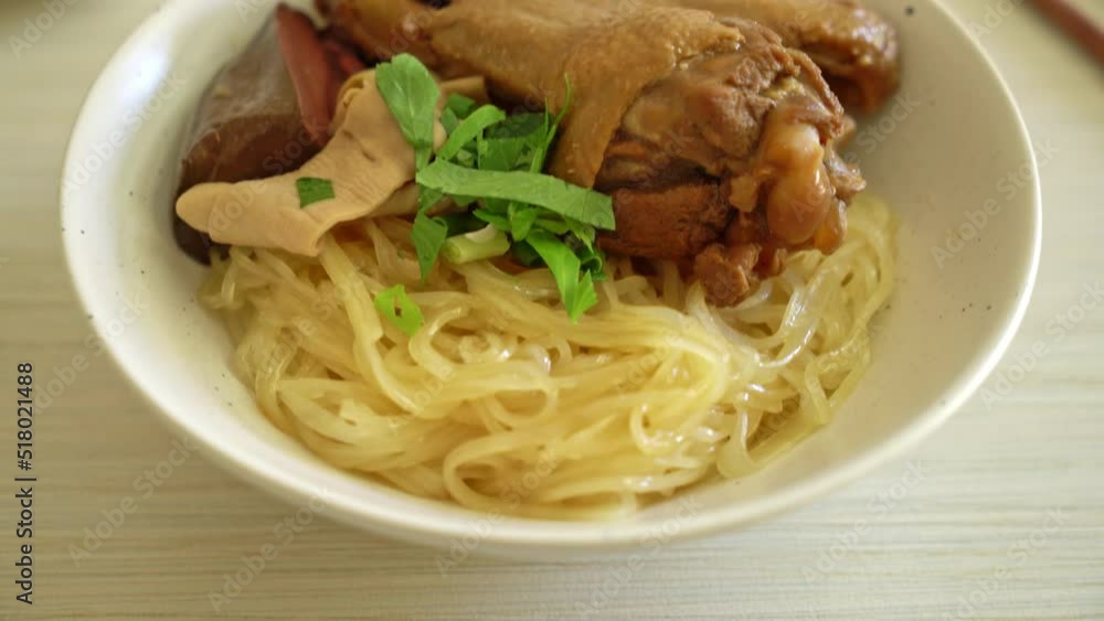 dried noodles with braised duck in white bowl - Asian food style dried noodles with braised duck in white bowl - Asian food style