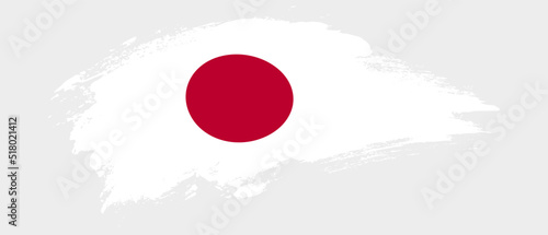National flag of Japan with curve stain brush stroke effect on white background
