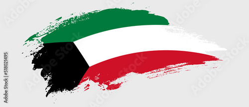 National flag of Kuwait with curve stain brush stroke effect on white background