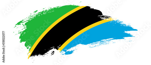 National flag of Tanzania with curve stain brush stroke effect on white background