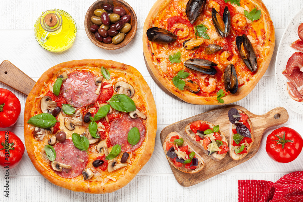 Italian cuisine. Pizza and toasts Italian cuisine. Pizza and toasts