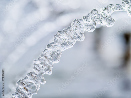 Splashes of water against light background.