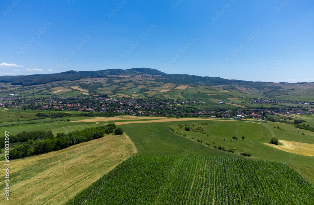an aerial view of a village in Transylvania - Romania
