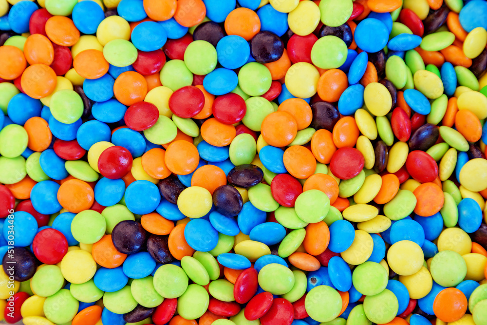 Closeup view of colorful small candies. Beautiful sweets