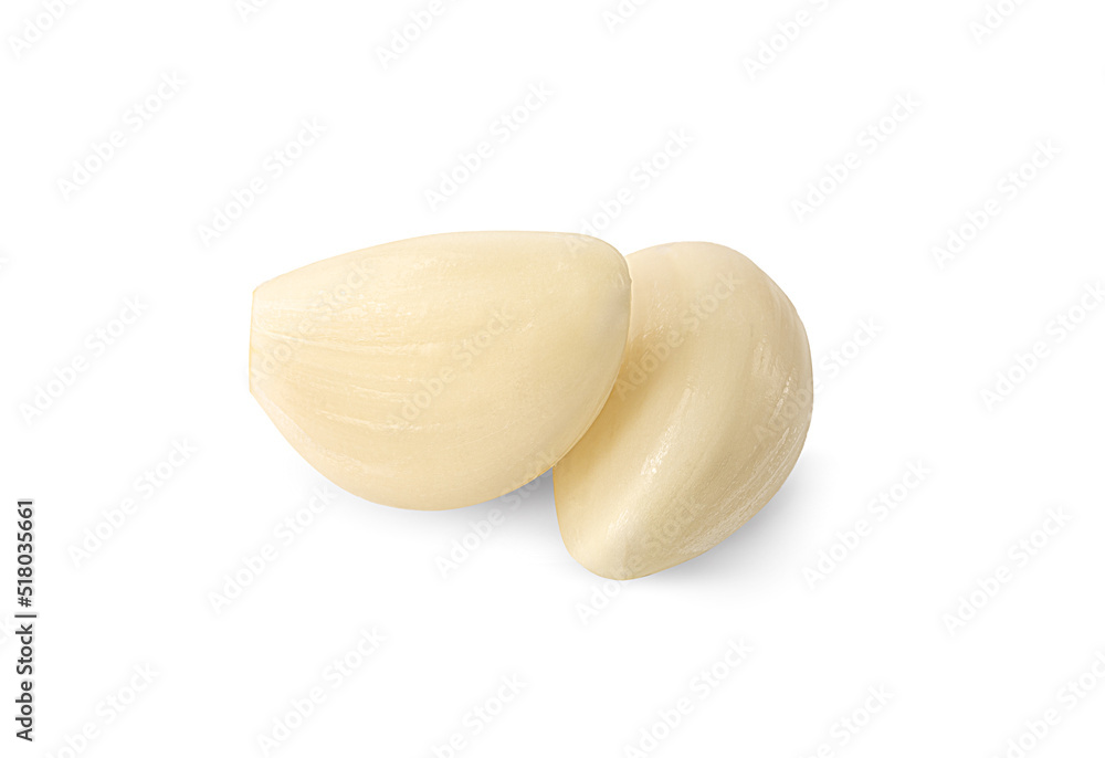 Fresh garlic cloves isolated on white background. Spice for health. Macro photo Fresh garlic cloves isolated on white background. Spice for health. Macro photo
