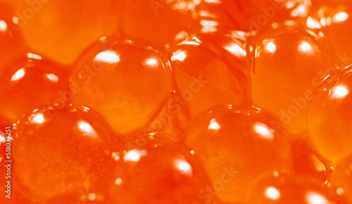 Red caviar as an abstract background.