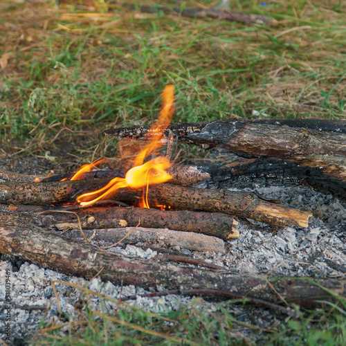 View of a small campfire in the camp