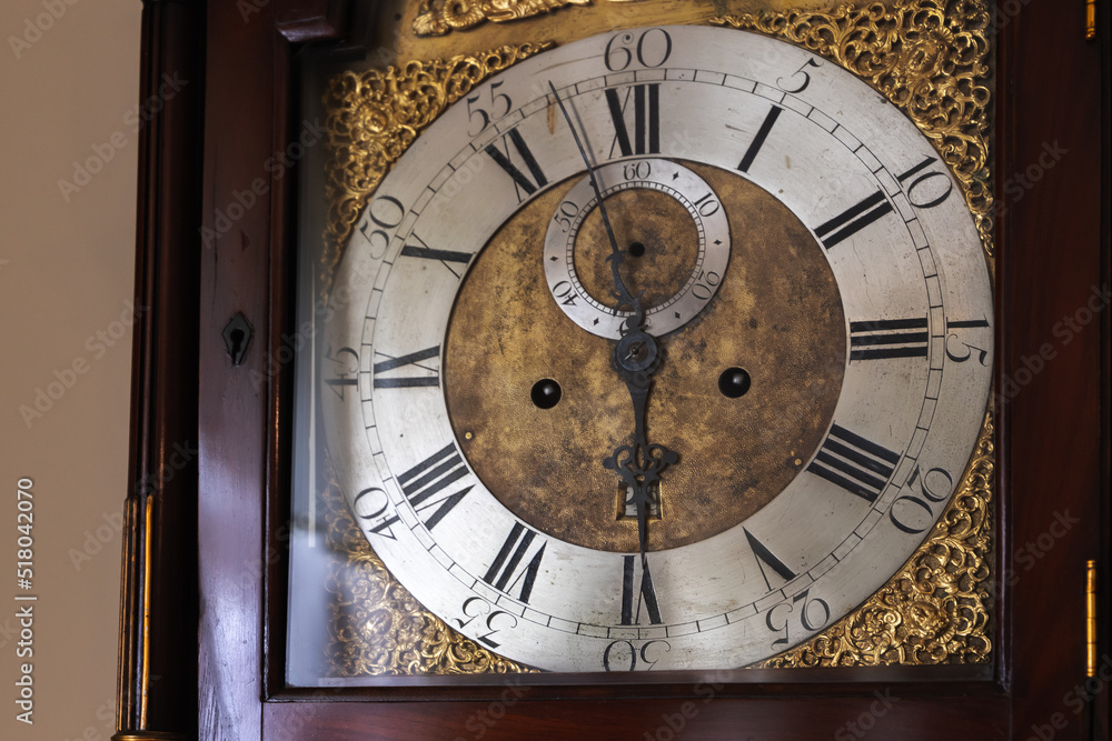Vintage grandfather clock deal with Roman numerals Stock Photo | Adobe Stock