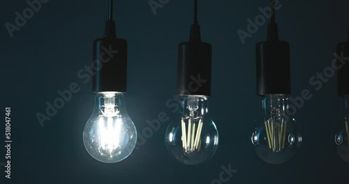 light bulbs lit up in the dark photo