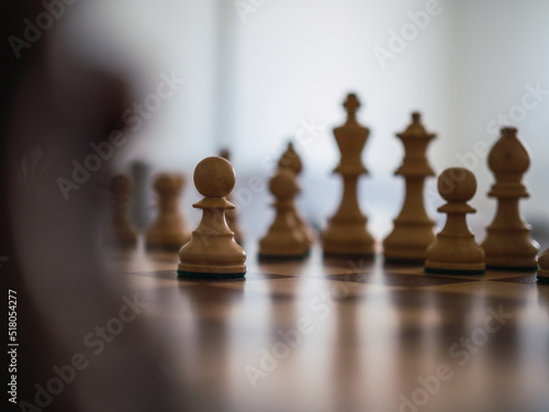 Chess pawn in the middle of the board  ready for battle