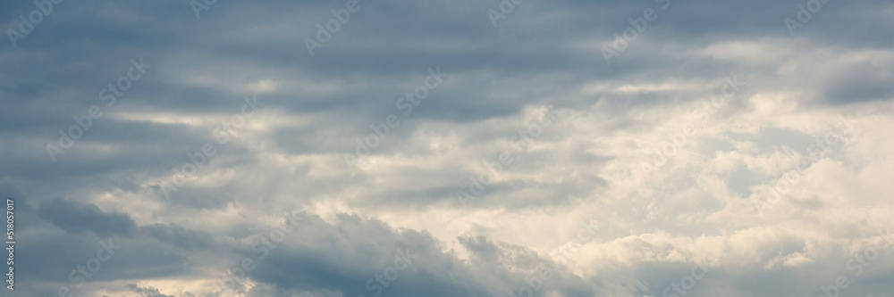 Beautiful sky background with clouds. Scenic cloudscape. Wide panoramic background for design.