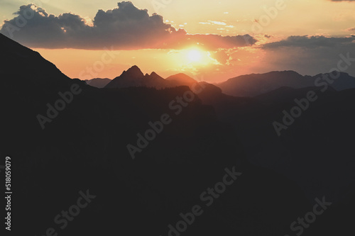Mountain peaks during sunset. Silhouettes of mountain peaks. Magli   and Zelengora  Bosnia and Herzegovina.