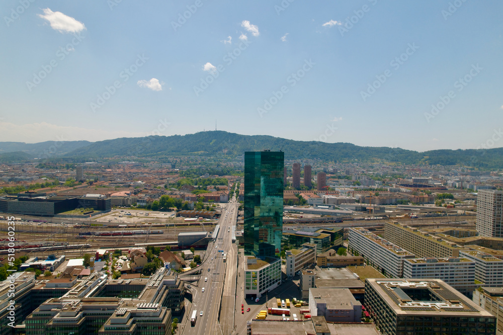 Aerial view of City of Zürich with skyscraper Prime Tower and main road with Hard Bridge at industrial district on a sunny summer day. Photo taken June 20th, 2022, Zurich, Switzerland.
