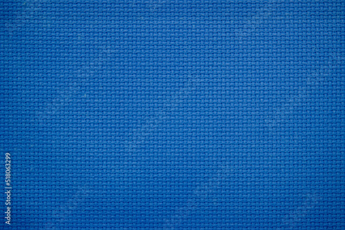 Closeup of blue fabric texture for background used. Pattern blue dark denim, linen, natural cotton satin textile.
