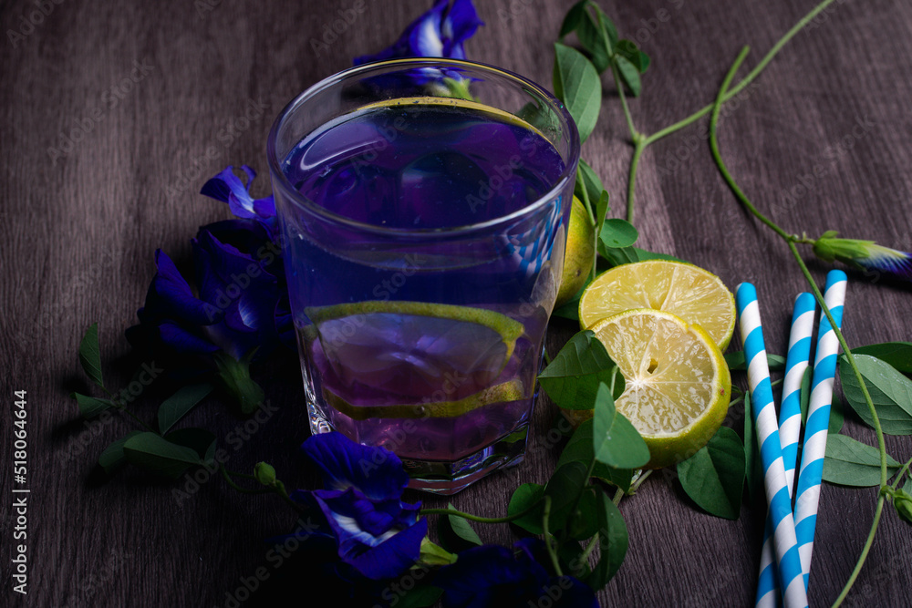 Butterfly pea and lemon juice, healthy drinks. Dark tones Butterfly pea and lemon juice, healthy drinks. Dark tones