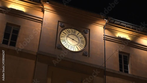 Lighted Clock Tower On The Historic Main Square In Cesena, Emilia Romagna, Italy. Low Angle Shot photo