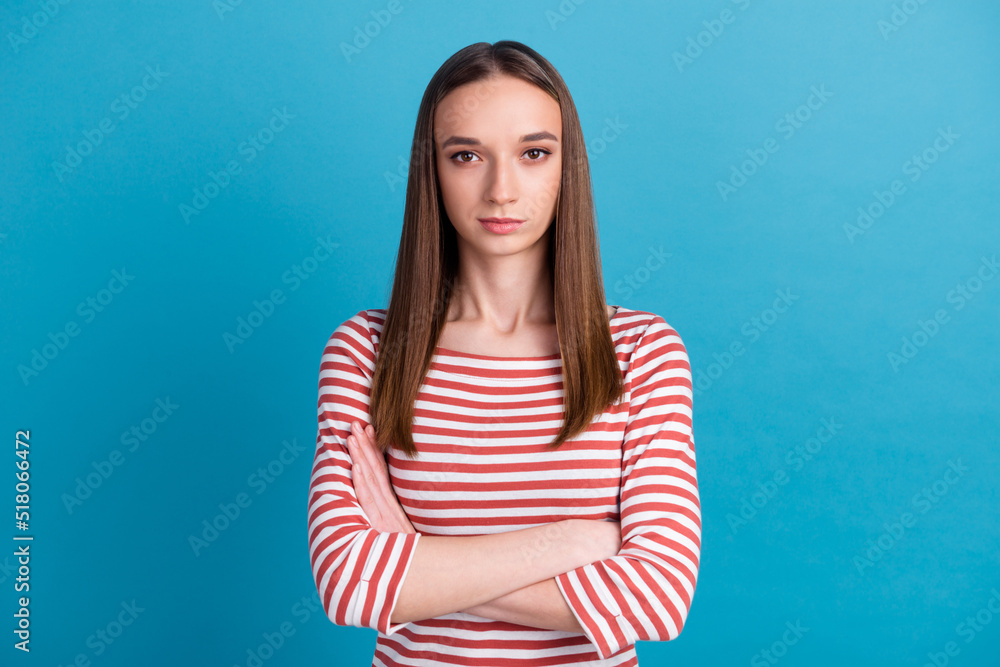 Photo of cool attractive business lady arms crossed wear casual shirt isolated blue color background Photo of cool attractive business lady arms crossed wear casual shirt isolated blue color background