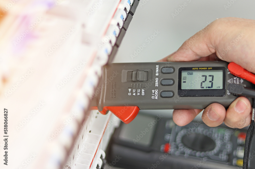 Measurement of control panel parameters using a digital multimeter.