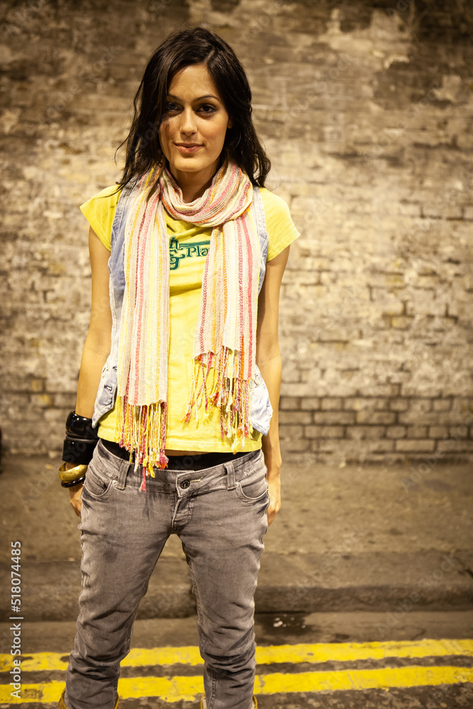 Urban Fashion. A beautiful young mixed race model in a relaxed mood. From a series of images with the same model.
