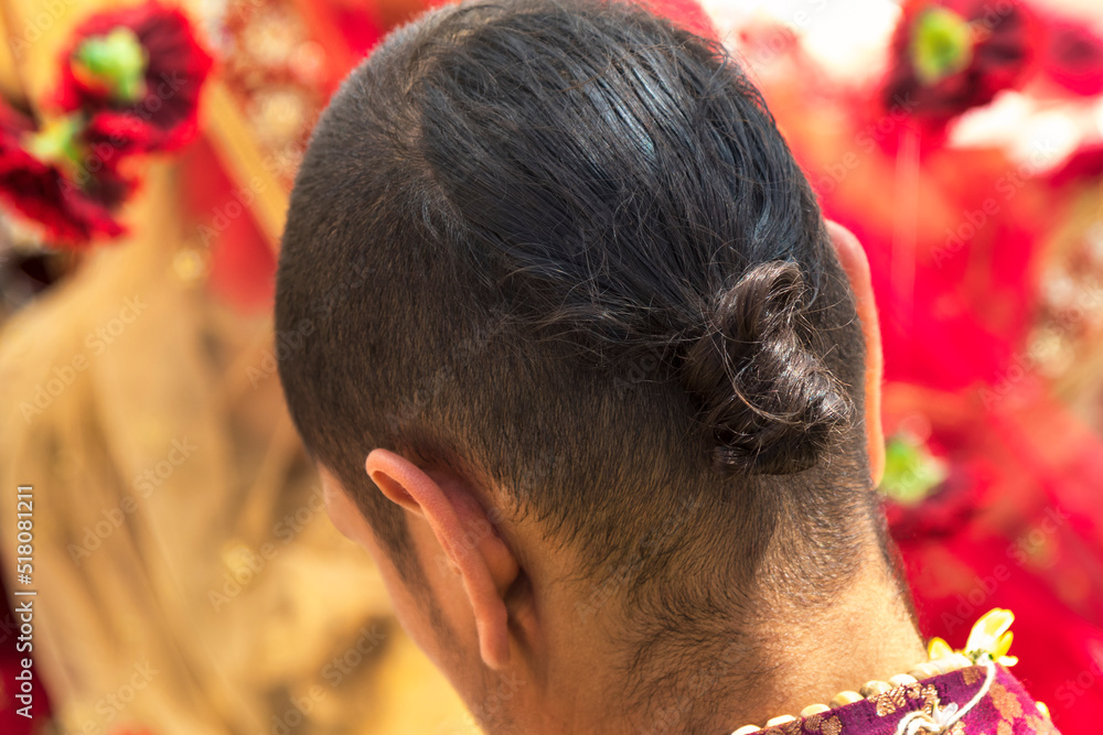 Obraz premium indian man ponytail