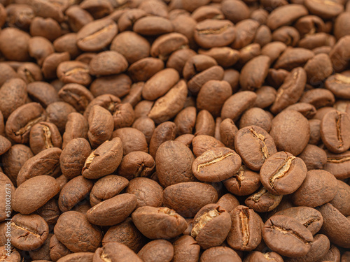 Macro shot of fresh aromatic roasted coffee beans
