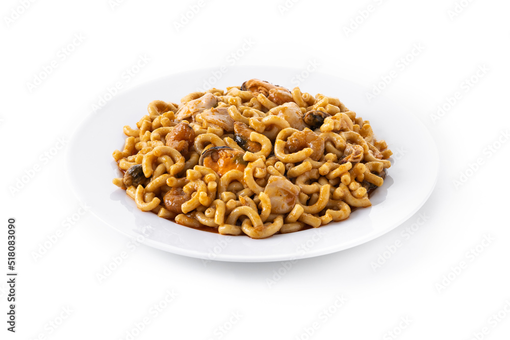 Traditional Spanish fideua. Noodle paella isolated on white background. Traditional Spanish fideua. Noodle paella isolated on white background.