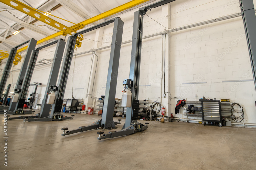 Fototapeta premium Premises with devices in car workshop