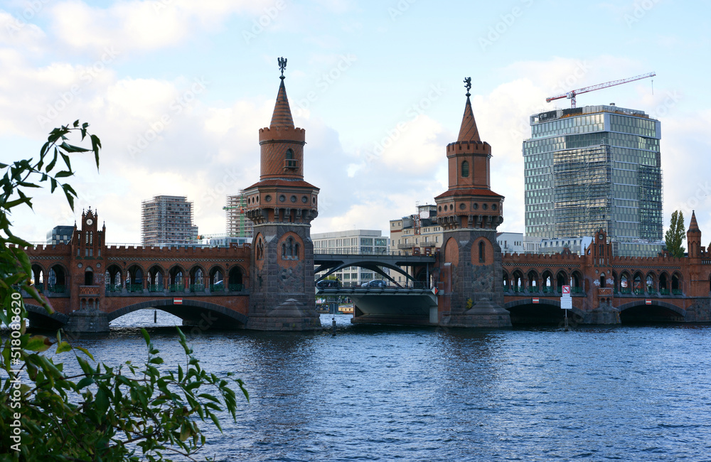 Berlin, Germany view to the Oberbaumbrücke and construction sites with new buildings