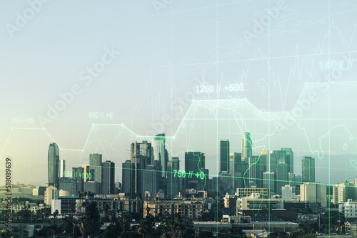 Double exposure of abstract virtual statistics data hologram on Los Angeles city skyscrapers background, statistics and analytics concept
