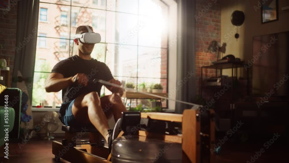 Futuristic Meta Home Gym: Strong Athletic Black Man Exercising on Rowing Machine Wearing Virtual Reality Headset. Muscular Mixed Race Sportsman Stays Healthy and Connected Using VR Workout Service Futuristic Meta Home Gym: Strong Athletic Black Man Exercising on Rowing Machine Wearing Virtual Reality Headset. Muscular Mixed Race Sportsman Stays Healthy and Connected Using VR Workout Service