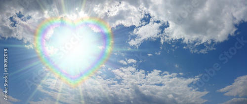 Photography Stunning rainbow heart sunburst Summer Cloud Scape background - blue sky and flu