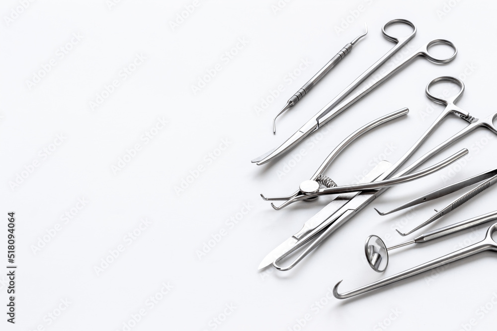 Stack of surgical medical steel equipment at surgery desk Stack of surgical medical steel equipment at surgery desk