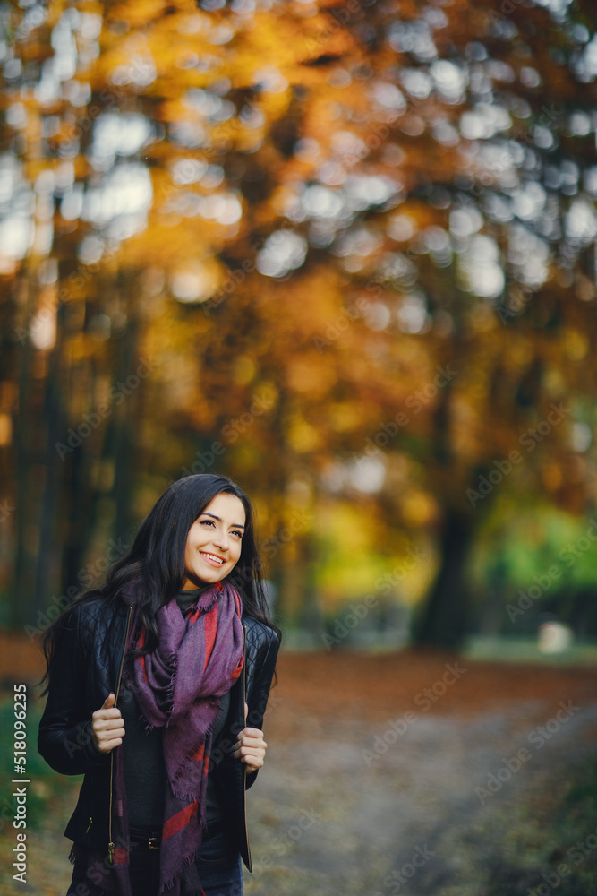 brunette girl relaxing at the park brunette girl relaxing at the park