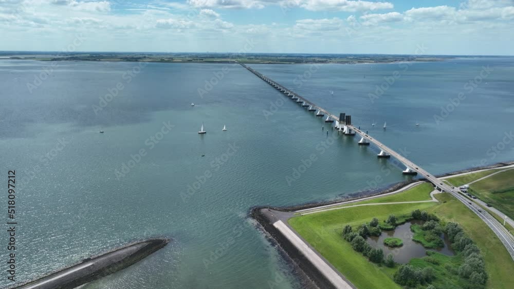 custom made wallpaper toronto digitalZeelandbridge infinity bridge in the distance aerial drone view. part of Delta works. Dutch infrastructure holland Zeeland. Transporation delivery logisitics road. Overhead view. Holland.