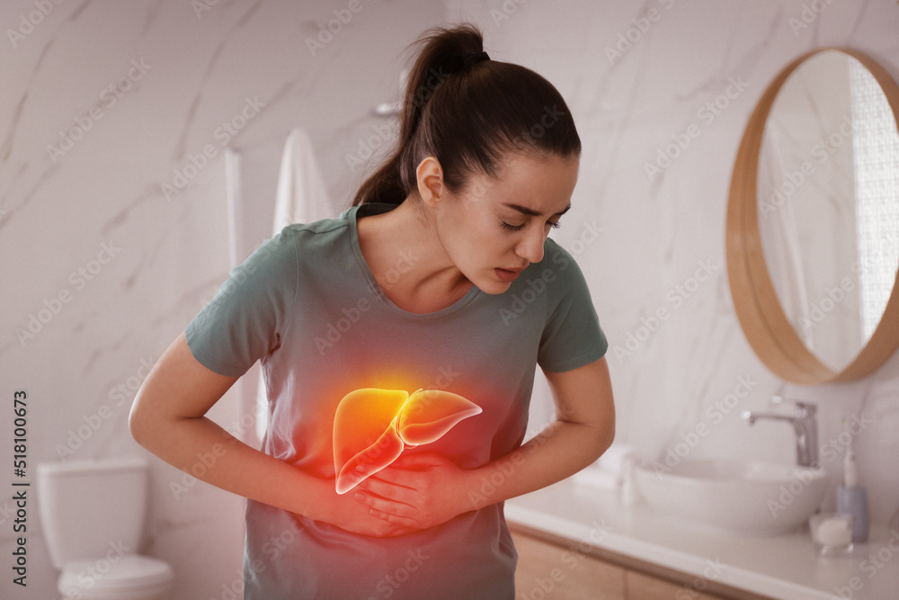 Sick woman suffering from pain in bathroom and illustration of unhealthy liver. Hepatitis disease - obrazy, fototapety, plakaty 