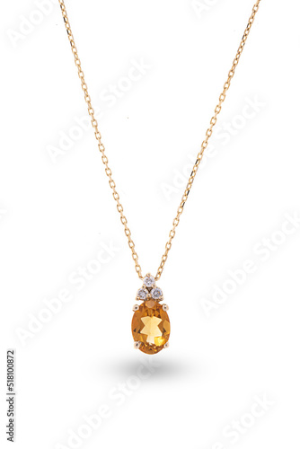 Gold necklace with diamonds and citrine, isolated on white