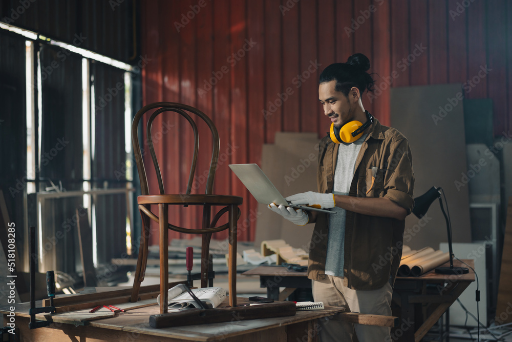Portrait Young Asian man Carpenter in carpentry workshop Portrait Young Asian man Carpenter in carpentry workshop